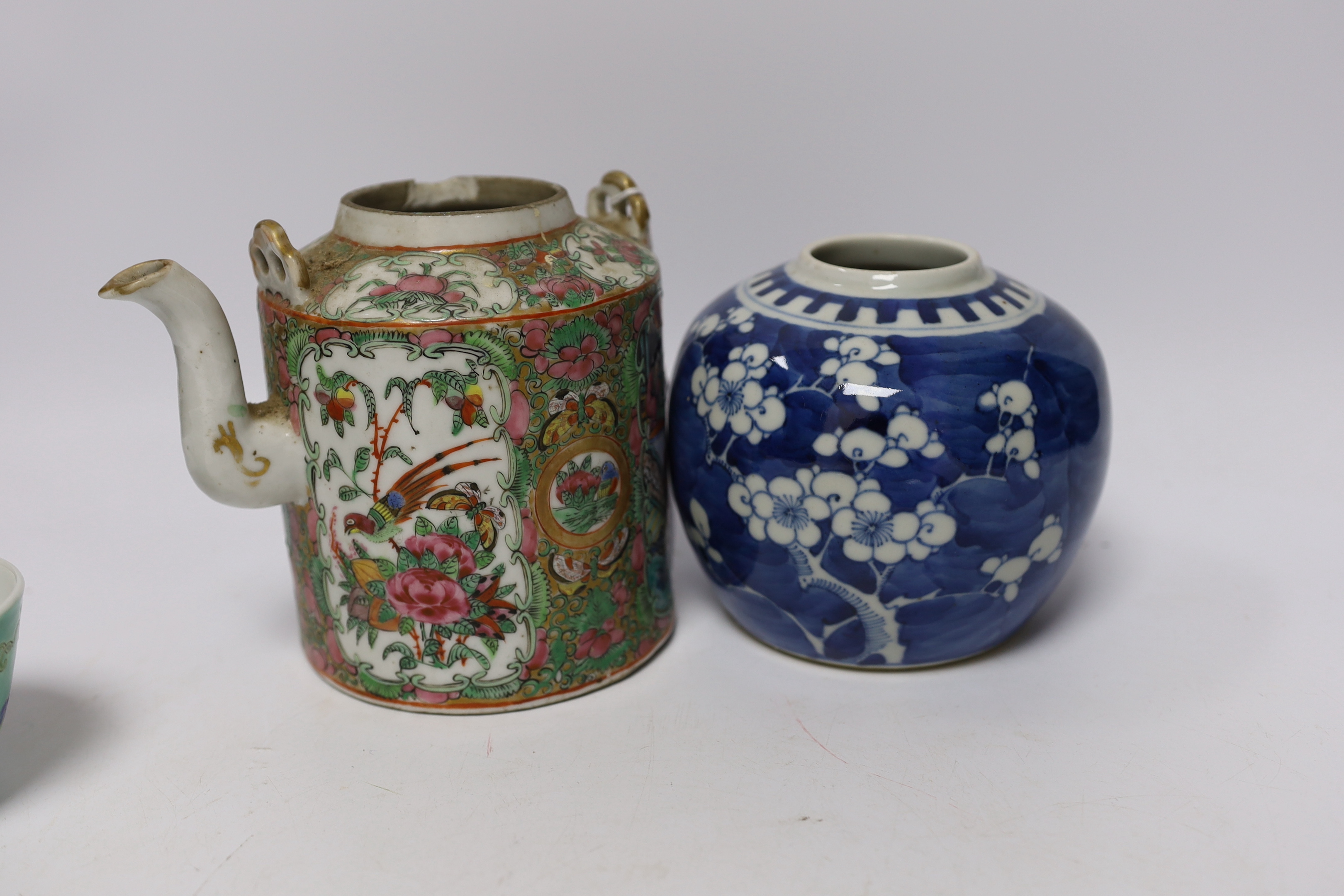 A collection of Chinese ceramics including a blue and white prunus flower jar, a famille rose teapot and a turquoise ground tea bowl, largest 13.5cm high